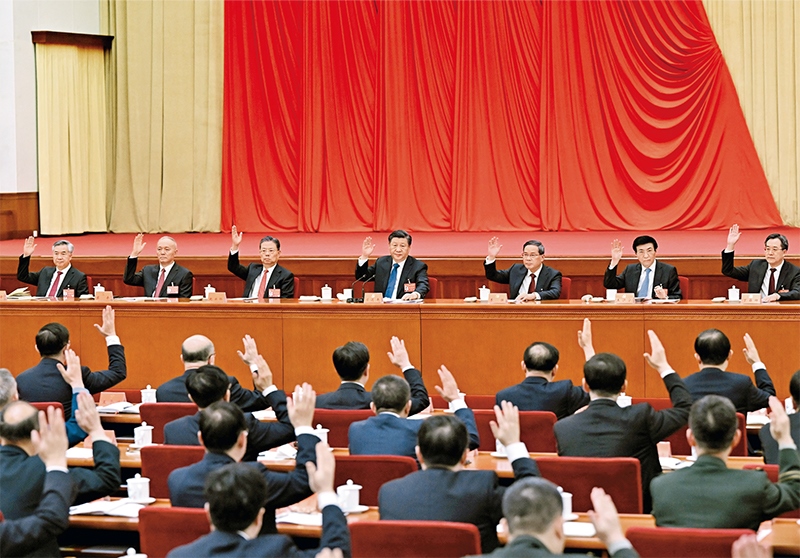 中國共產(chǎn)黨第二十屆中央委員會第二次全體會議，于2023年2月26日至28日在北京舉行。這是習近平、李強、趙樂際、王滬寧、蔡奇、丁薛祥、李希等在主席臺上。 新華社記者 謝環(huán)馳/攝