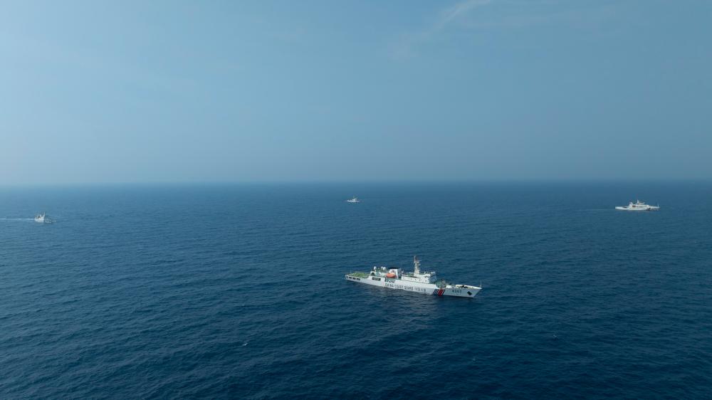 4月22日，中越海警艦艇編隊(duì)在北部灣海域開展聯(lián)合巡邏。（中國海警供圖）
